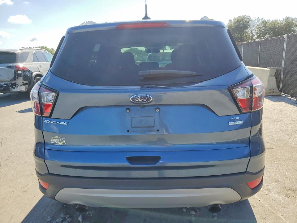 Photo 6 from auction – 2018 FORD ESCAPE with VIN 1FMCU0GD0JUC67171