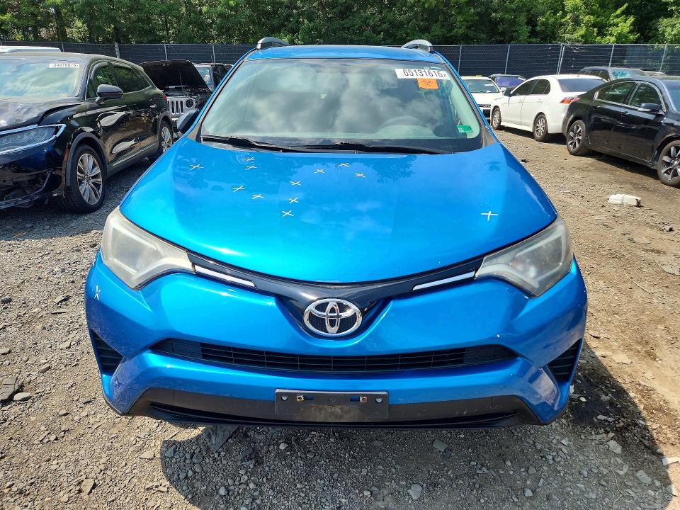 Photo 5 from auction – 2016 TOYOTA RAV4 with VIN 2T3BFREVXGW481946