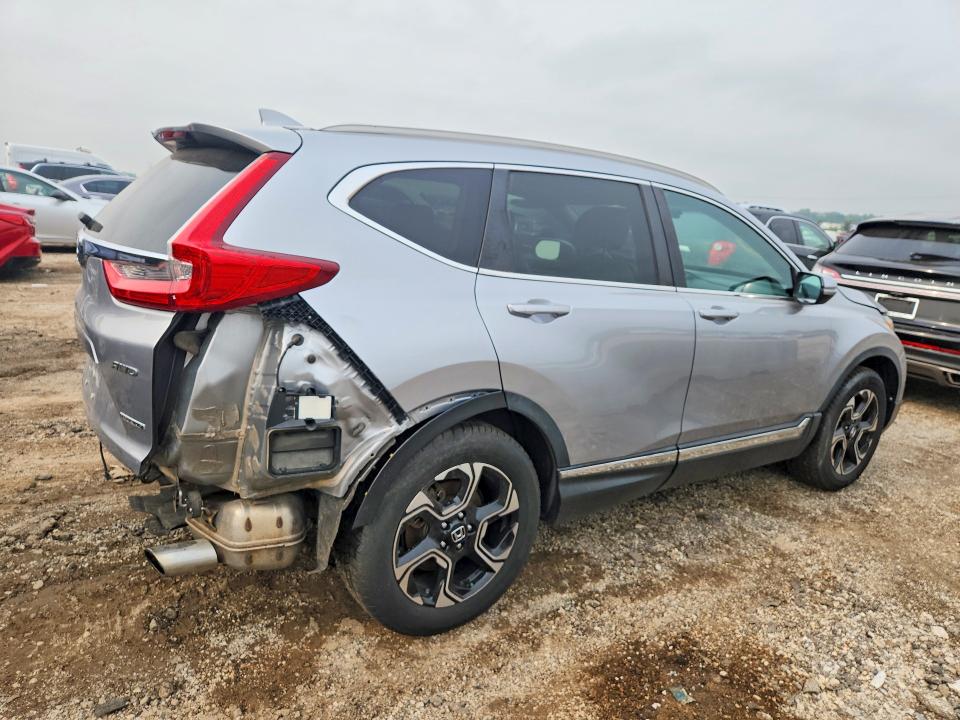 Photo 3 from auction – 2017 HONDA CR-V with VIN 5J6RW2H95HL000441