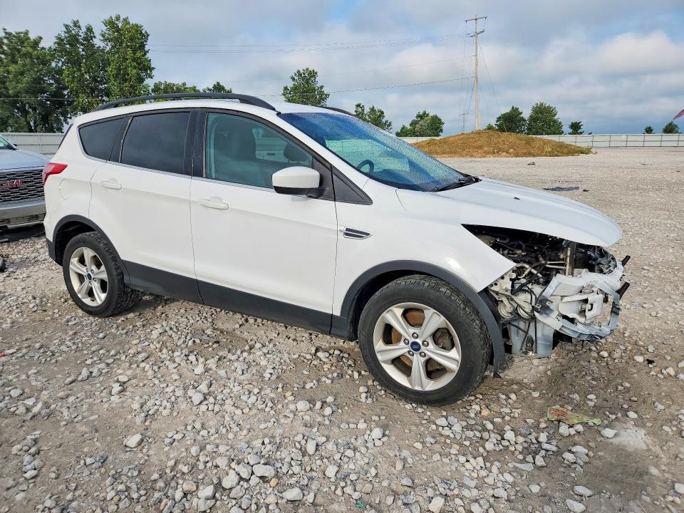 Photo 4 from auction – 2014 FORD ESCAPE with VIN 1FMCU9GX7EUB60817