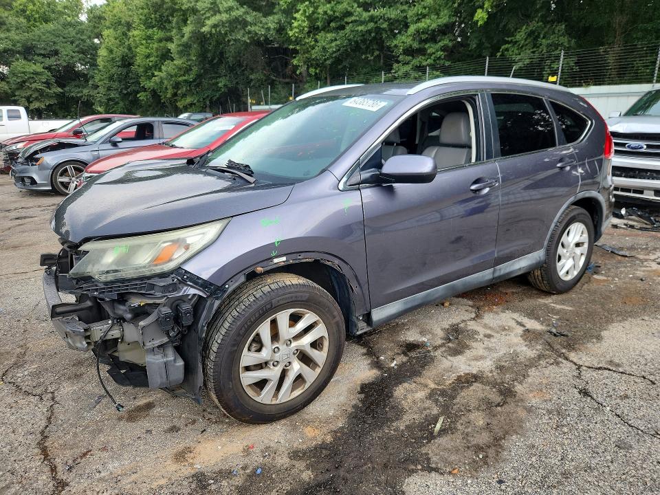 HONDA CR-V 2015 with VIN 2HKRM4H73FH654569 - Photo from auction