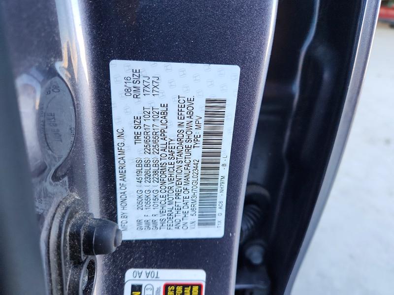 Photo 14 from auction – 2016 HONDA CR-V with VIN 5J6RM3H70GL023442