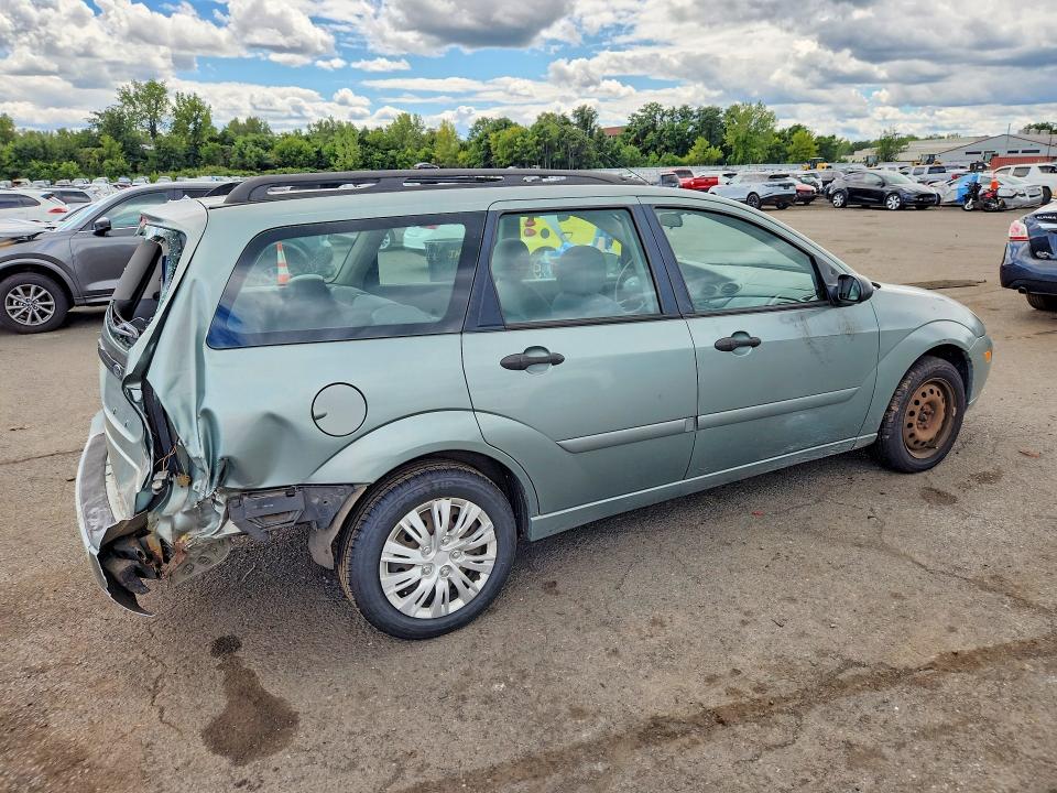 Photo 3 from auction – 2004 FORD FOCUS with VIN 1FAFP36Z04W197211