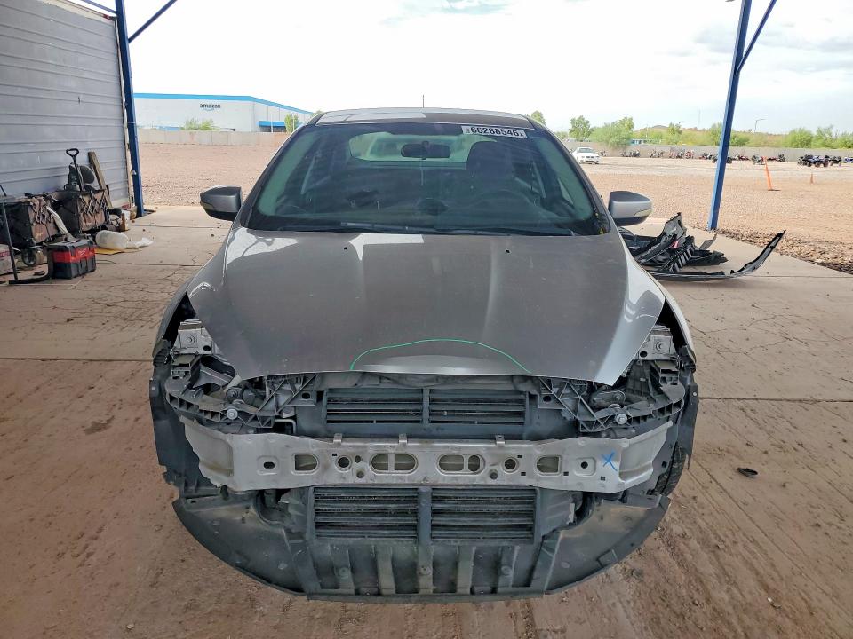 Photo 5 from auction – 2016 FORD FOCUS with VIN 1FADP3F27GL254407