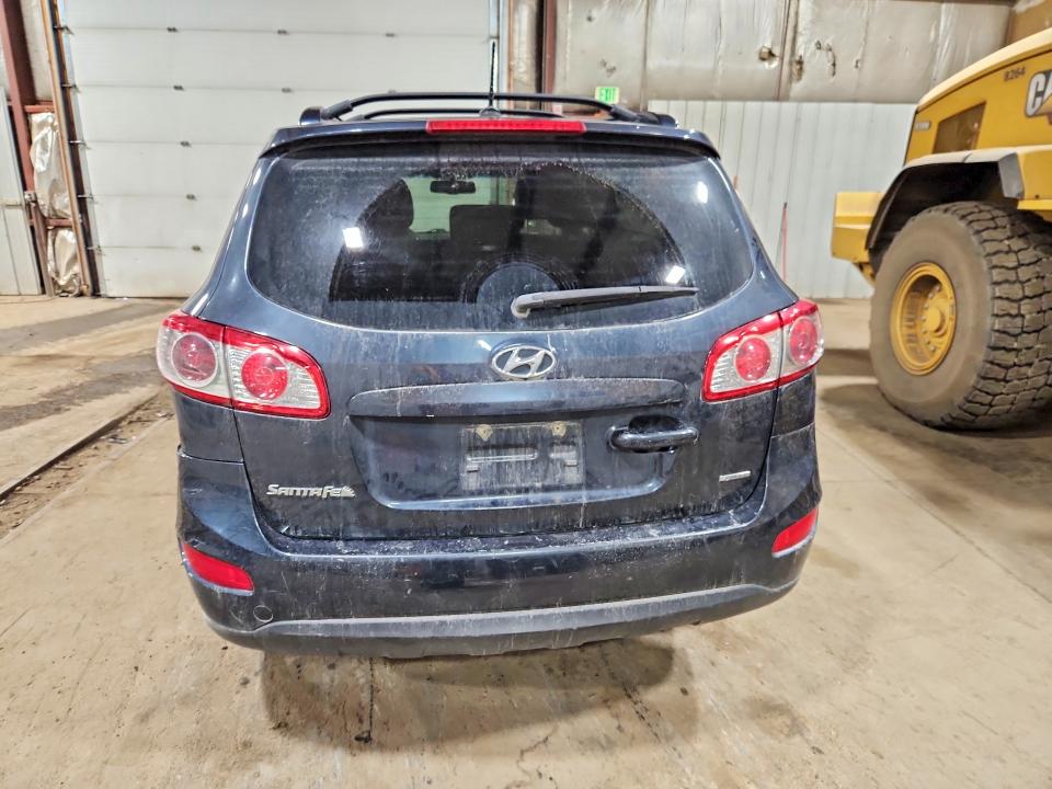 Photo 6 from auction – 2012 HYUNDAI SANTA FE with VIN 5XYZHDAG0CG097976