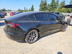 Foto 3 de la subasta – 2021 TESLA MODEL 3 con VIN 5YJ3E1EA0MF908347
