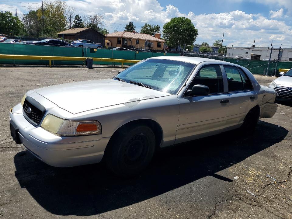 FORD CROWN VICTORIA 2002 with VIN 2FAFP71W42X143464 - Photo from auction