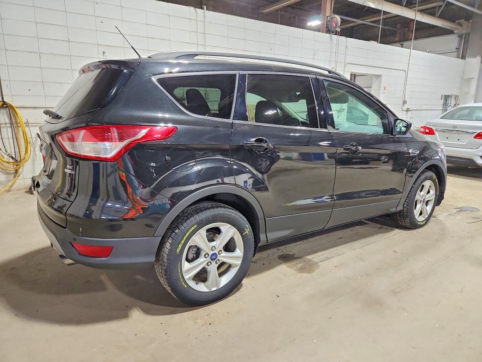 Снимка 3 от търг – 2014 FORD ESCAPE с VIN 1FMCU9GX3EUD44121