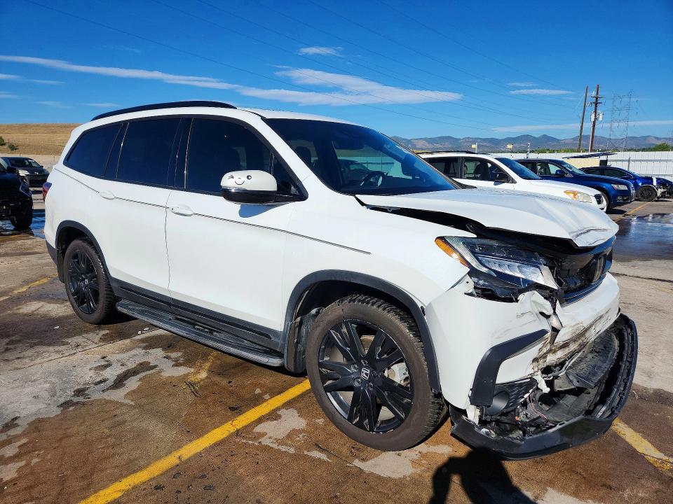 Photo 4 from auction – 2021 HONDA PILOT with VIN 5FNYF6H79MB041949