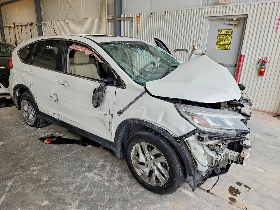 Photo 4 from auction – 2016 HONDA CR-V with VIN 5J6RM4H55GL027507
