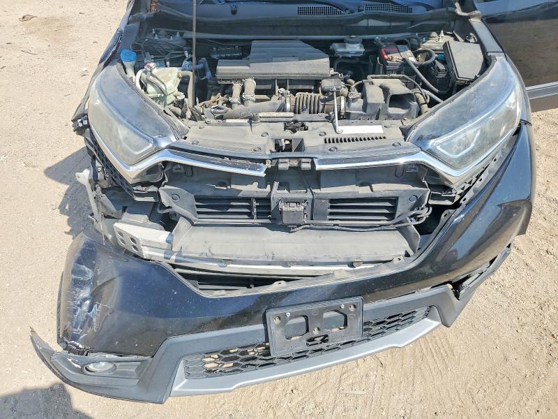 Photo 11 from auction – 2019 HONDA CR-V with VIN 7FARW2H52KE061070