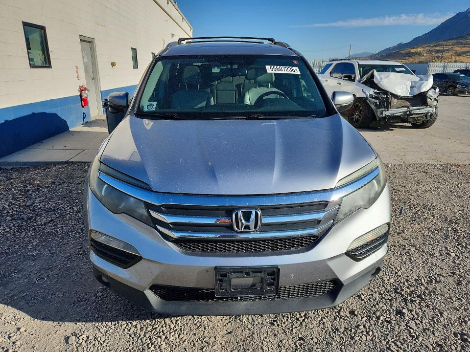 Photo 5 from auction – 2016 HONDA PILOT with VIN 5FNYF6H56GB009429