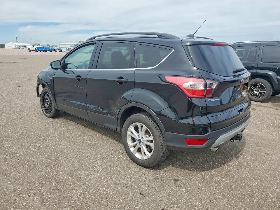 Photo 2 from auction – 2017 FORD ESCAPE with VIN 1FMCU9G9XHUB80694