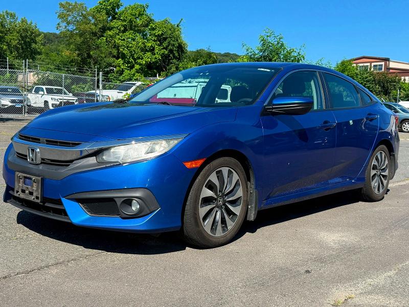 Photo 2 from auction – 2016 HONDA CIVIC with VIN 2HGFC1F44GH640415