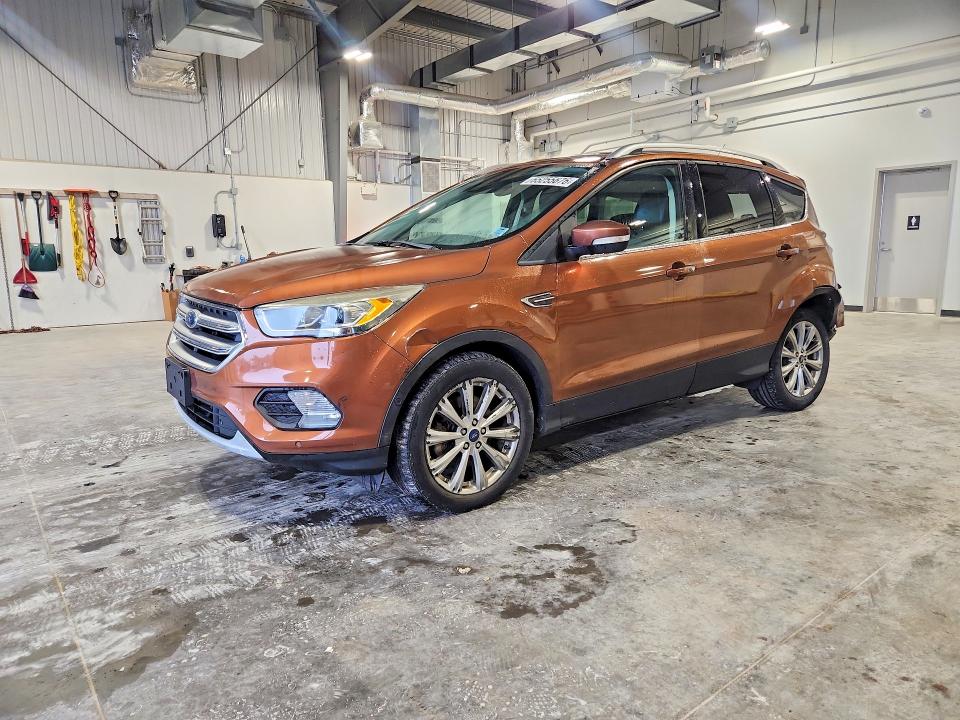 FORD ESCAPE 2017 with VIN 1FMCU9J91HUE40540 - Photo from auction