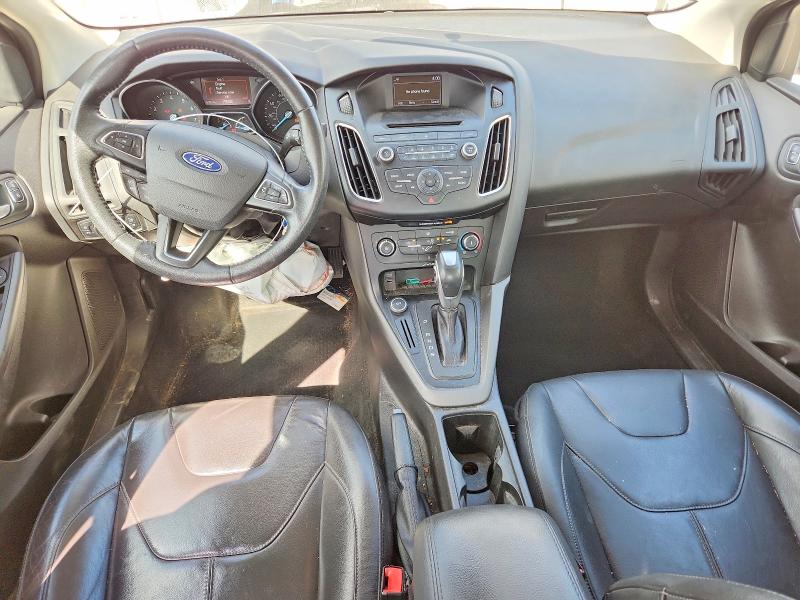 Photo 8 from auction – 2015 FORD FOCUS with VIN 1FADP3F2XFL255453