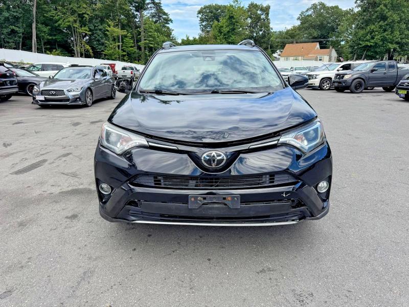 Photo 6 from auction – 2018 TOYOTA RAV4 with VIN 2T3RFREV4JW857885