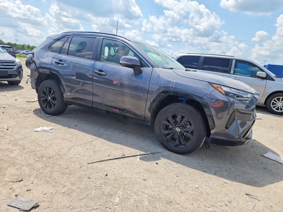 Photo 4 from auction – 2022 TOYOTA RAV4 with VIN JTM16RFV0ND069409