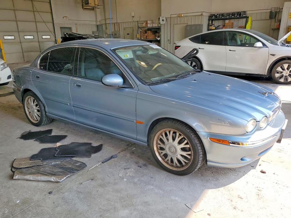 Photo 4 from auction – 2004 JAGUAR X-TYPE with VIN SAJEA51C54WE05920