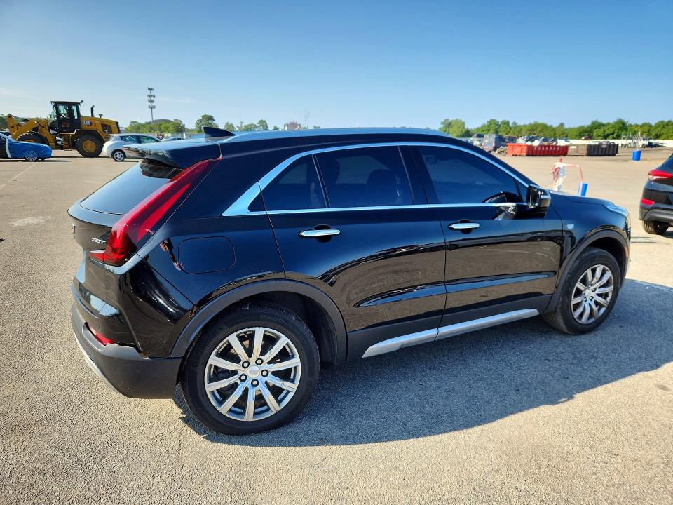Photo 3 from auction – 2021 CADILLAC XT4 with VIN 1GYFZDR45MF076601