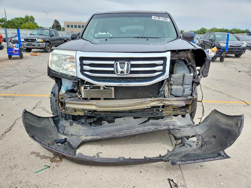 Photo 5 from auction – 2014 HONDA PILOT with VIN 5FNYF4H92EB017516