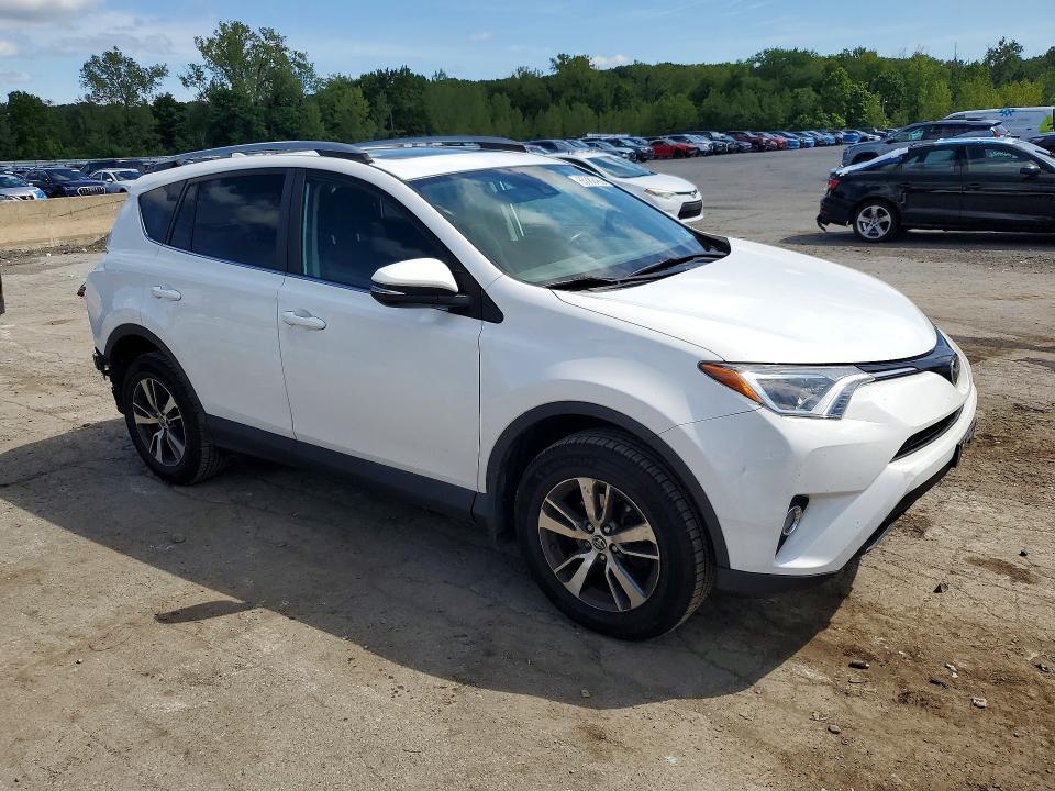 Photo 4 from auction – 2018 TOYOTA RAV4 with VIN 2T3RFREV8JW744523