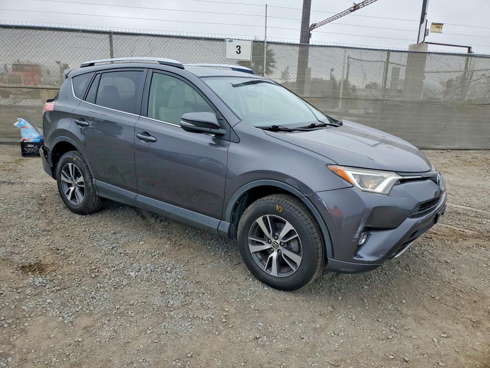 Photo 4 from auction – 2016 TOYOTA RAV4 with VIN JTMWFREV5GJ092924