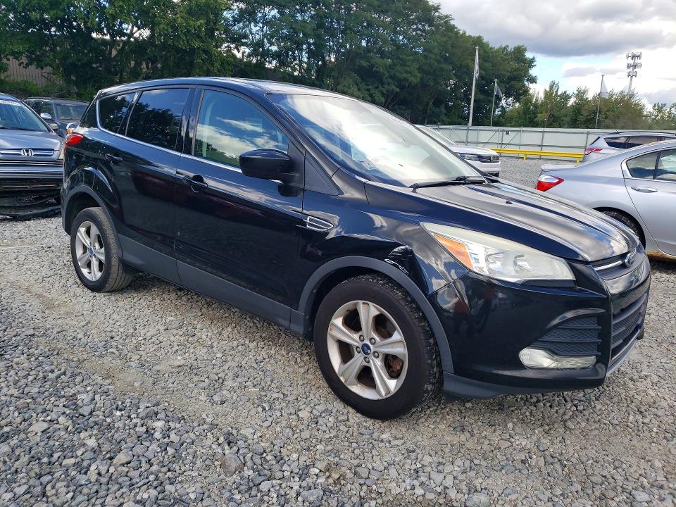 Photo 4 from auction – 2014 FORD ESCAPE with VIN 1FMCU9G99EUD32508
