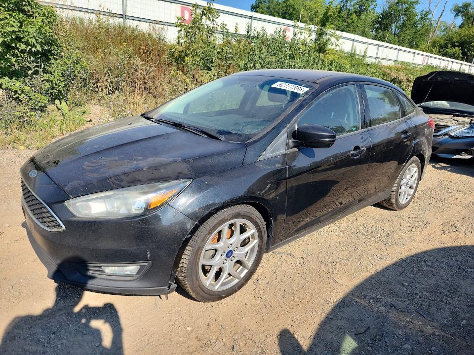 FORD FOCUS 2015 with VIN 1FADP3F23FL299388 - Photo from auction