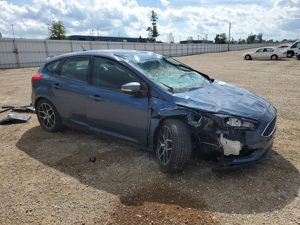 Photo 4 from auction – 2018 FORD FOCUS with VIN 1FADP3M26JL258104
