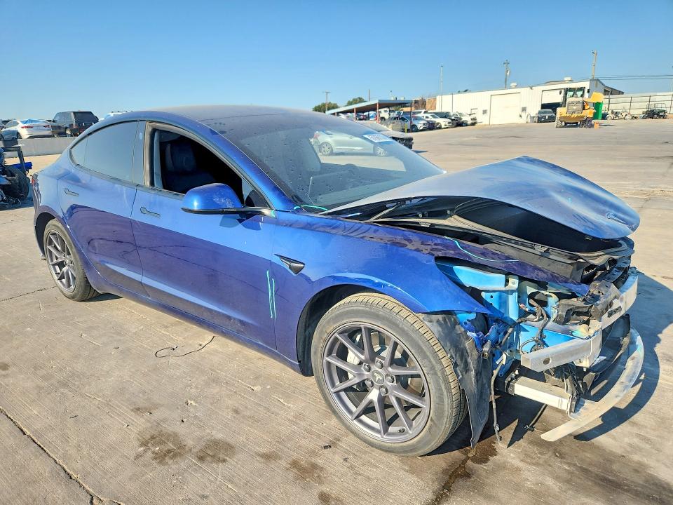Photo 4 from auction – 2023 TESLA MODEL 3 with VIN 5YJ3E1EA7PF470088