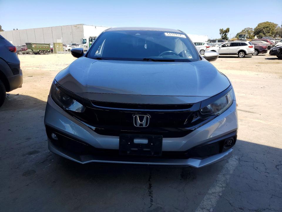 Photo 5 from auction – 2019 HONDA CIVIC with VIN 19XFC2F83KE214372