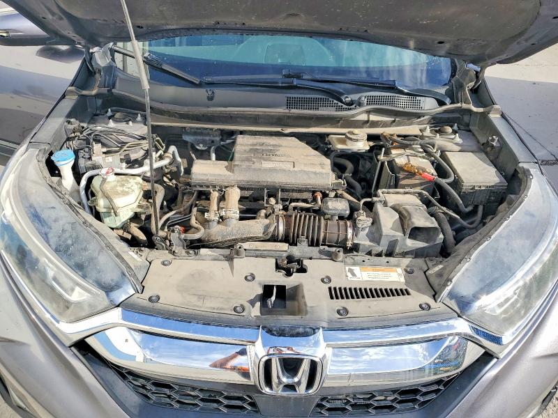Photo 11 from auction – 2019 HONDA CR-V with VIN 7FARW2H80KE054676
