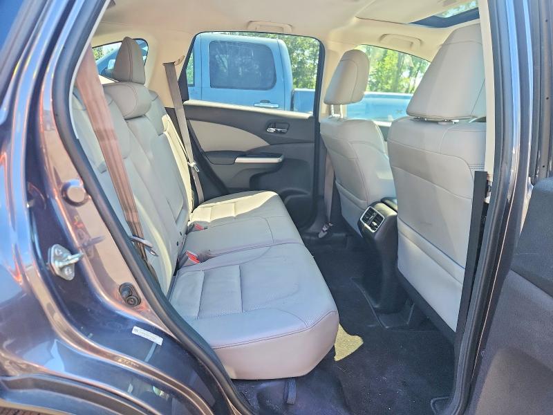 Photo 11 from auction – 2015 HONDA CR-V with VIN 5J6RM4H93FL053802