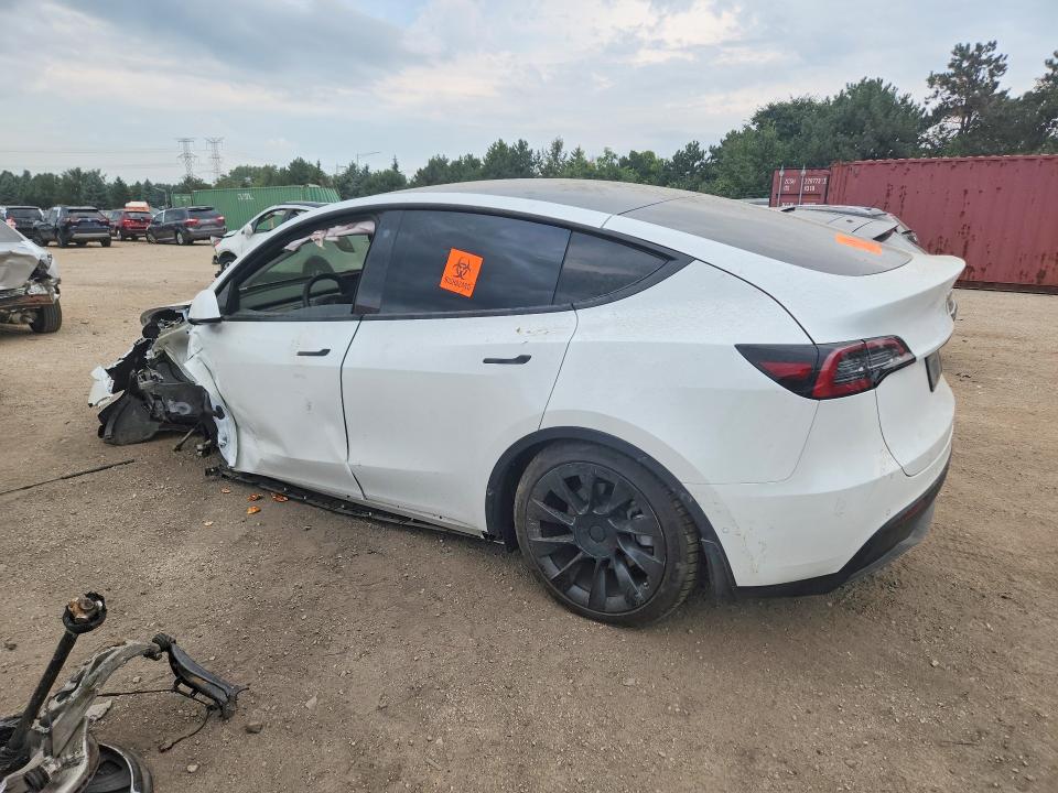 Photo 2 from auction – 2021 TESLA MODEL Y with VIN 5YJYGDEEXMF299949