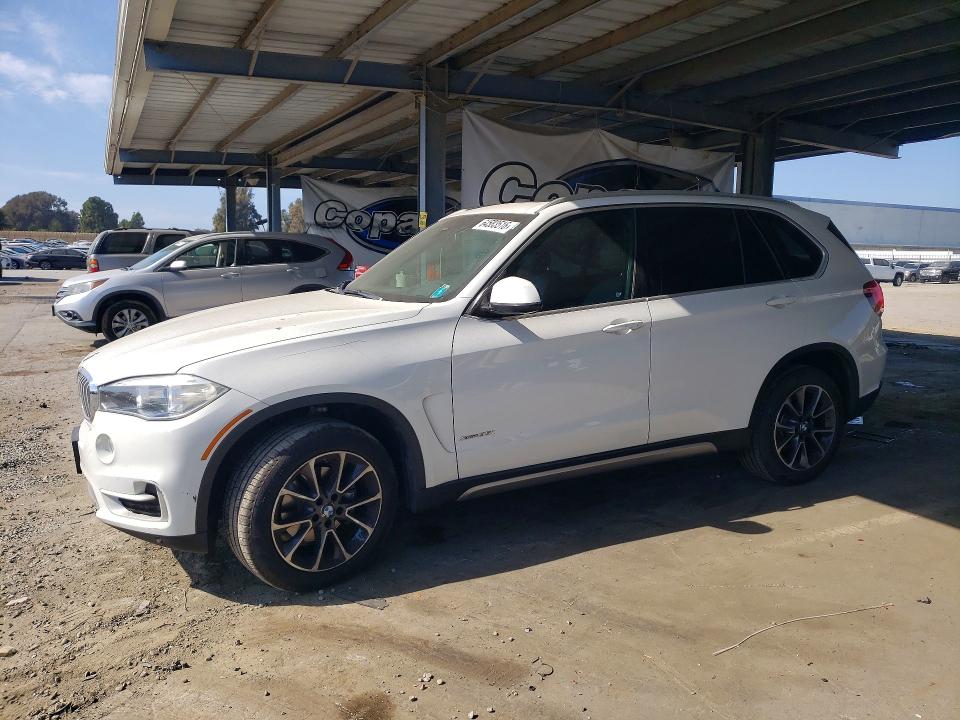 BMW X5 2018 with VIN 5UXKR0C54J0X91476 - Photo from auction