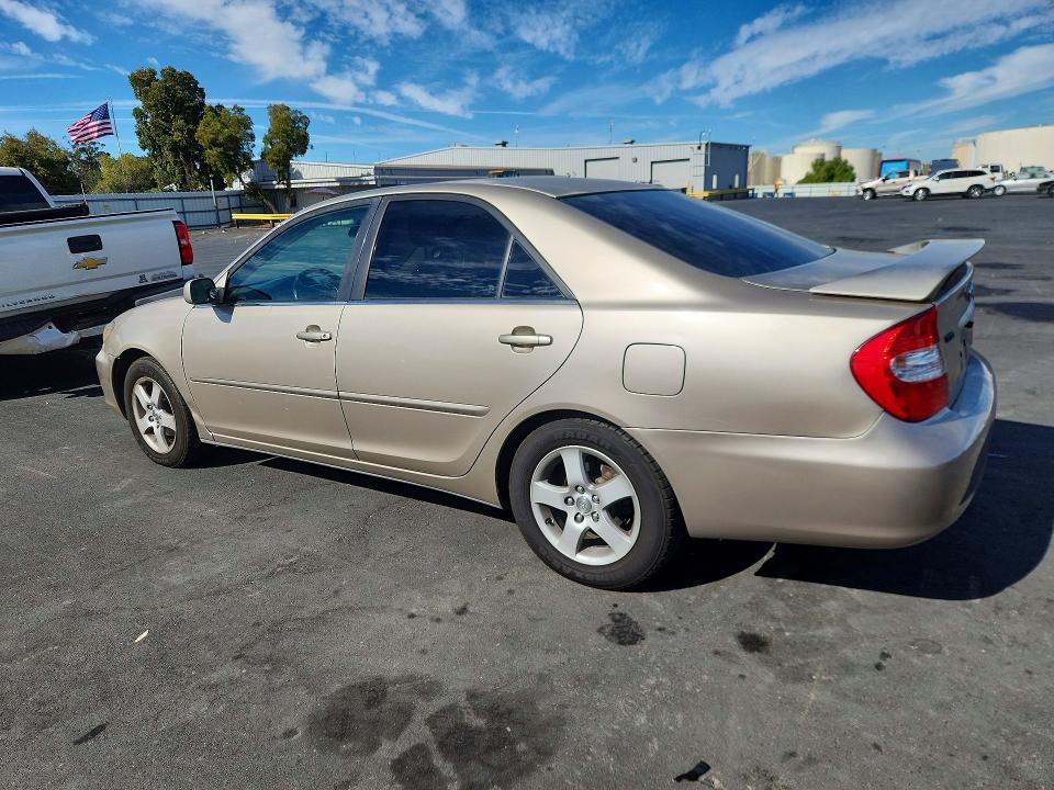 Photo 2 from auction – 2002 TOYOTA CAMRY with VIN JTDBE30K320045997