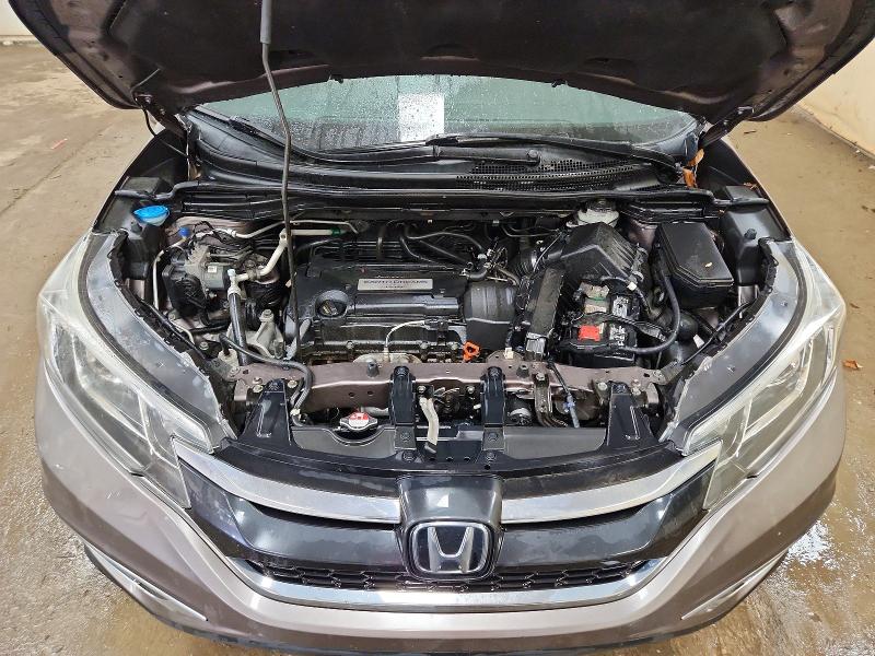 Photo 12 from auction – 2015 HONDA CR-V with VIN 5J6RM4H93FL061589