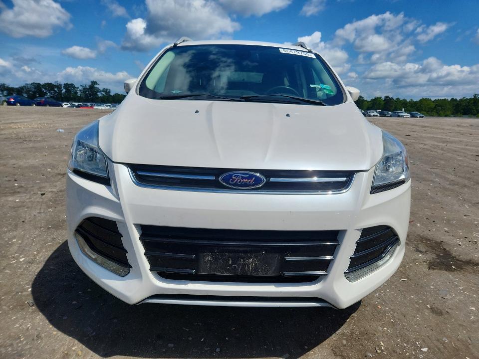 Photo 5 from auction – 2014 FORD ESCAPE with VIN 1FMCU9J91EUE31803