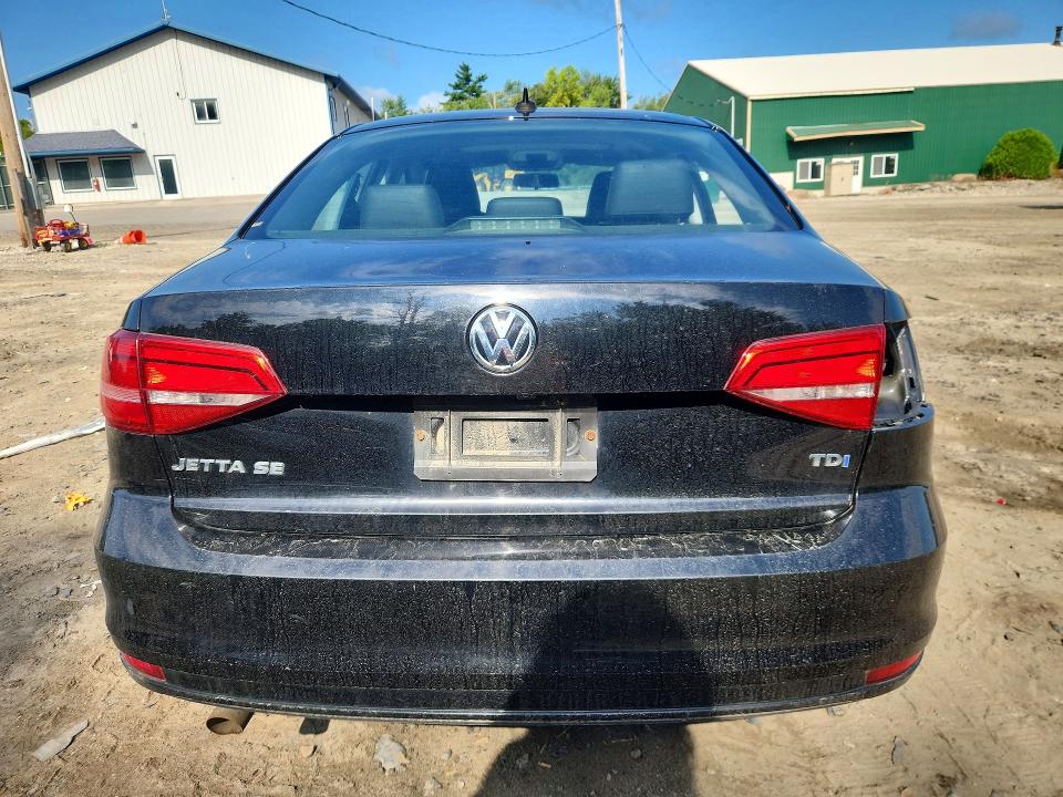 Photo 6 from auction – 2015 VOLKSWAGEN JETTA with VIN 3VW3A7AJXFM321301