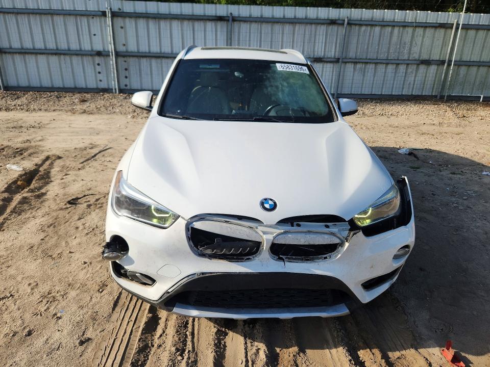 Photo 5 from auction – 2017 BMW X1 with VIN WBXHT3C30H5F70537