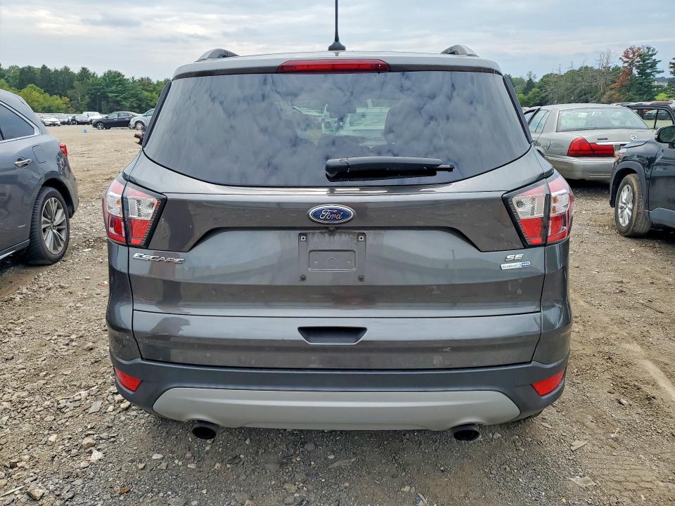 Photo 6 from auction – 2018 FORD ESCAPE with VIN 1FMCU9GD5JUB05394