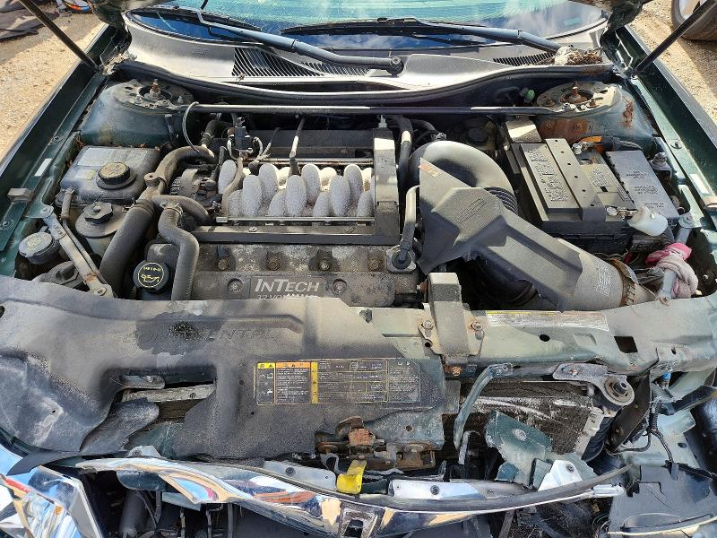 Photo 11 from auction – 2002 LINCOLN CONTINENTAL with VIN 1LNHM97V02Y672590