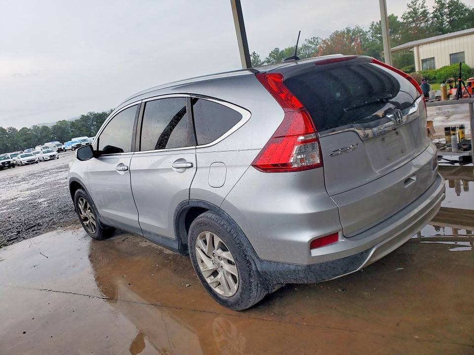 Photo 2 from auction – 2015 HONDA CR-V with VIN 2HKRM3H78FH514365
