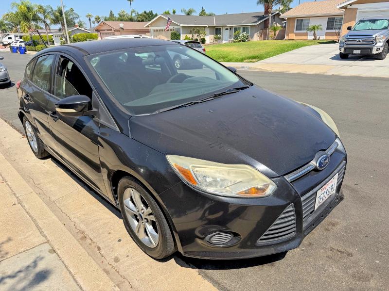 FORD FOCUS 2014 with VIN 1FADP3K22EL198461 - Photo from auction