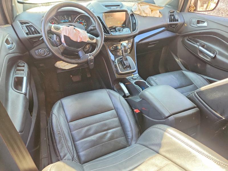 Photo 8 from auction – 2014 FORD ESCAPE with VIN 1FMCU0J99EUB60047