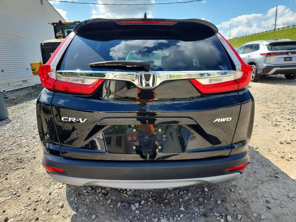 Photo 6 from auction – 2018 HONDA CR-V with VIN 2HKRW2H59JH601896