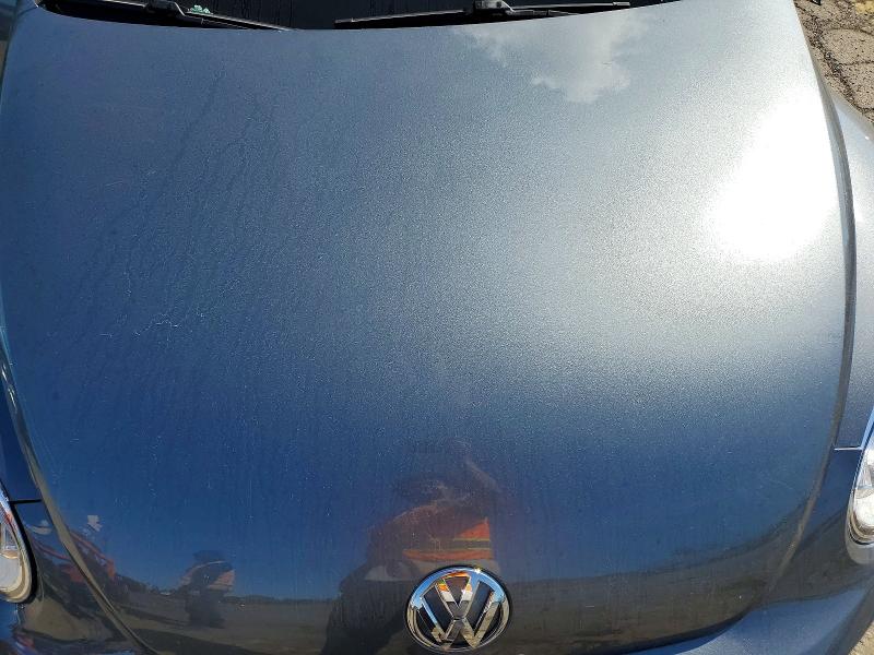 Photo 11 from auction – 2014 VOLKSWAGEN BEETLE with VIN 3VWJX7AT7EM631086