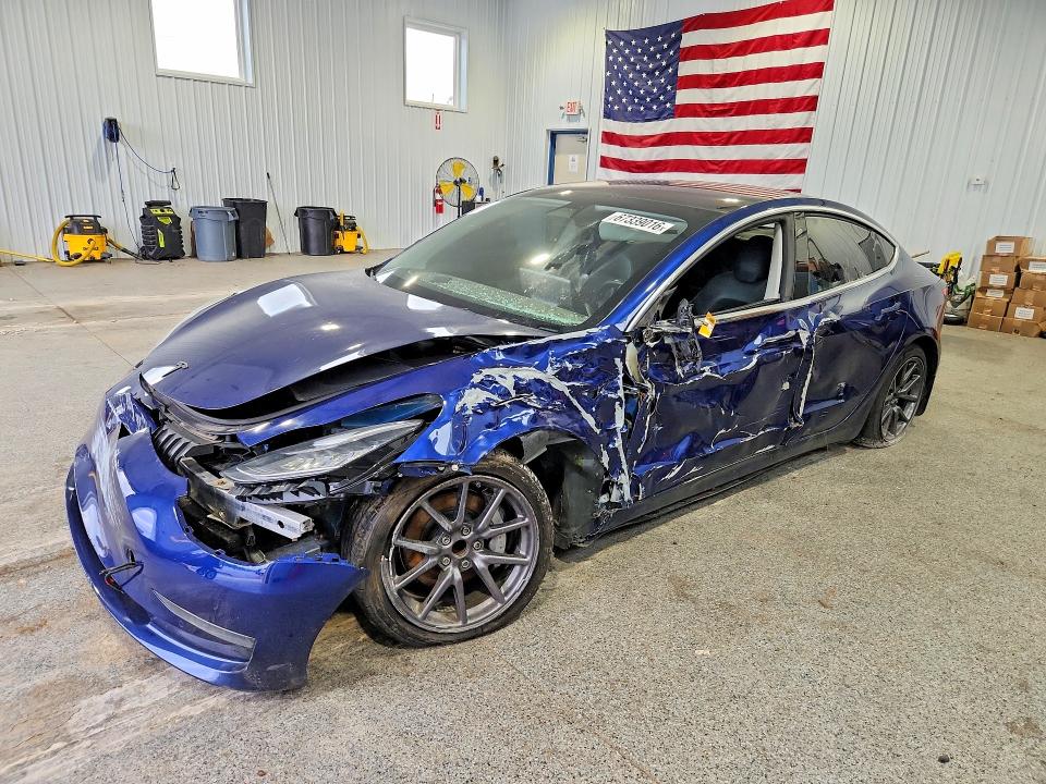 TESLA MODEL 3 2018 with VIN 5YJ3E1EA5JF125035 - Photo from auction