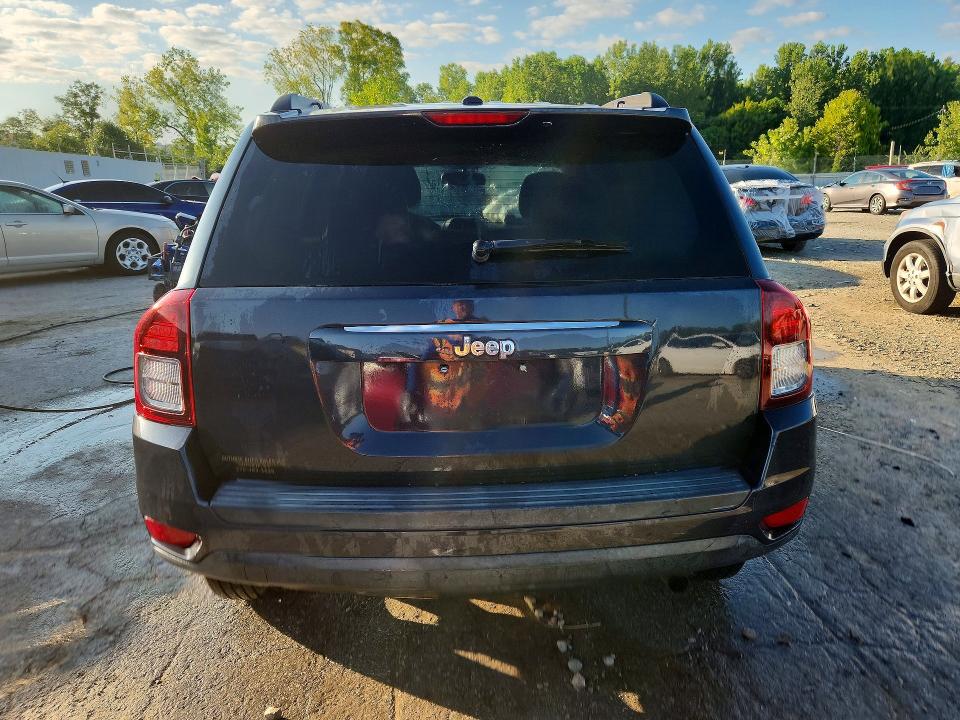 Photo 6 from auction – 2014 JEEP COMPASS with VIN 1C4NJCEA9ED647552